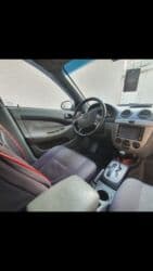lada kalina 2005: Chevrolet Lacetti: 0.6 l | Sedan — 3