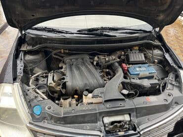 c klass mersedes: Nissan Tiida: 1.8 l | 2007 il Sedan — 14