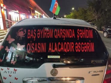 Yük daşımaları: Maşınların üzərinə yazı yazılması şüşələrə setka vinil çəkilməsi — 2