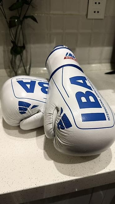Əlcəklər: Məhsul: IBA boks əlcəkləri Mma elceyi ile deyişilir Qutuda: 1 cüt boks — 1