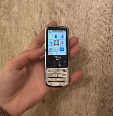 philips xenium x700: Nokia 6700 Slide, rəng - Gümüşü, Düyməli — 2