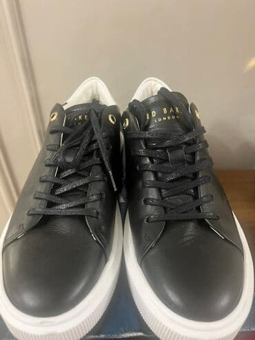 Ted Baker London brendindən olan bu qara rəngli krossovkalar qara