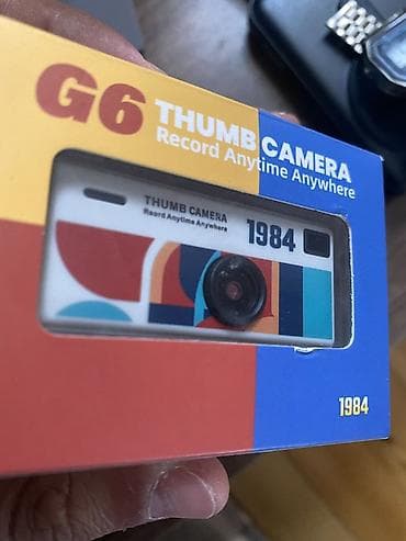 Videokameralar: G6 Thumb Camera – mini video/foto kamera Xüsusiyyətlər: - Çox kiçik — 2