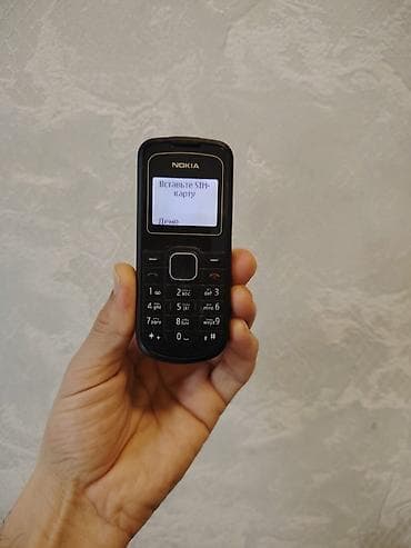 Nokia 1202 Orginal Antikvar Telefondur super isleyir Orginal adaptiri