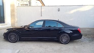 mercedes benz cl class: Mercedes‑Benz S-Class sedan (W221), qara rəng, V12 emblemli. Xarici — 4
