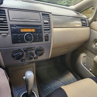 kvadrasikl satılır: Nissan Tiida sedan – gümüşü rəng Texniki xüsusiyyətlər və təchizat: - — 9