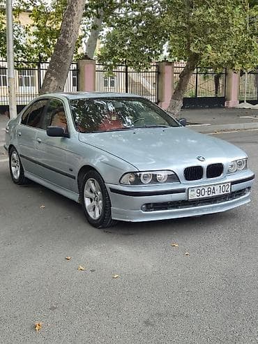 nissan skyline r34: BMW 5 series: 2.8 l | 1996 il Sedan — 5