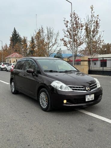 toyota prado qiymeti azerbaycanda: Nissan Tiida hatchback - Korpus: 5 qapılı hatchback, tünd qəhvəyi — 4