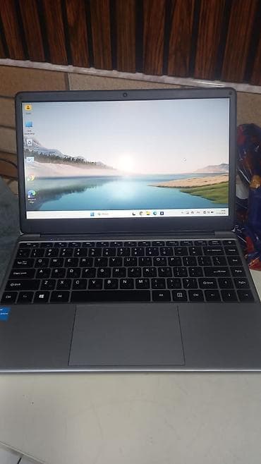 noutbuk masasi: Noutbuk – 14" geniş ekranlı, nazik çərçivəli, tam ölçülü klaviatura və — 1