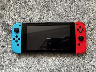 ANCAQ BARTER Nintendo switch V2,üstündən 128Gb əlavə yadaş və — 2