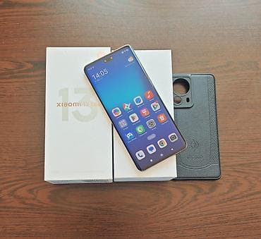 Мобильные телефоны и аксессуары: Xiaomi 13 Lite, 256 ГБ — 2