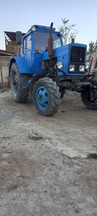 traktor teker: Mavi rəngli təkərli traktor Texniki xüsusiyyətlər və təyinat: - Ön və — 7