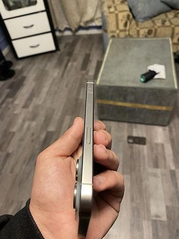 iphone 12 pro satilir: IPhone 15 Pro, 128 GB, Gümüşü, Simsiz şarj — 5