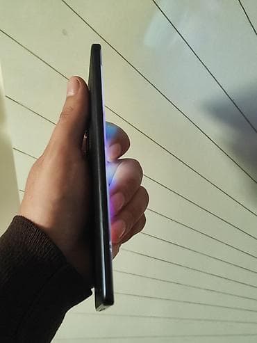 xiaomi not 10: Smartfon – böyük, tam ekranlı displey və ön kamera üçün mərkəzdə — 5