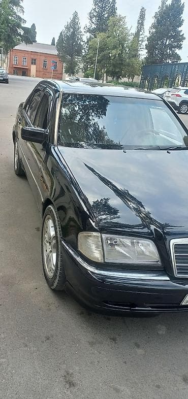 mersedes c class: Kandisonerde isleyir Mercedes-Benz sedan interyeri və texniki — 5