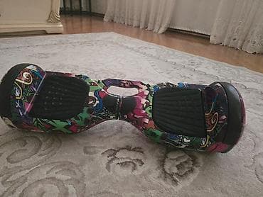 Elektrikli qiroskuter. Yeni kimi ancaq evde sürülüb. Sadece zaradkasi
