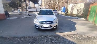 Opel Astra Caravan (universaI) – gümüşü rəng, ECOTEC mühərrikli