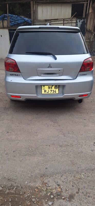 kvadrasikl satışı: Mitsubishi Airtrek Turbo – gümüşü rəngli, sport üslublu universaI/SUV — 2