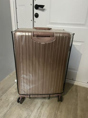 Qızılgül rəngli, dörd təkərli, səyahət üçün nəzərdə tutulmuş çamadan lalafo.az -da Qızılgül rəngli, dörd təkərli, səyahət üçün nəzərdə tutulmuş çamadan