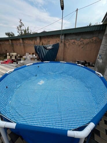 intex 732 x 366 x 132: Intex tərəfindən istehsal olunan bu yerüstü hovuz model A 10'x30" FT — 2