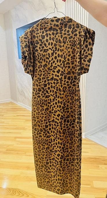 cins don: Leopar naxışlı qadın paltarı - Üslub: klassik və zərif, leopar print — 1