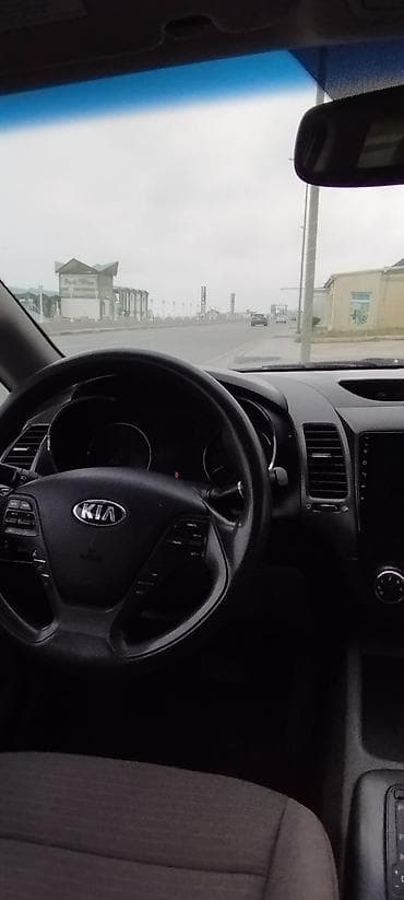 авто руль: Kia Forte: 1.8 л | 2013 г. Седан — 4