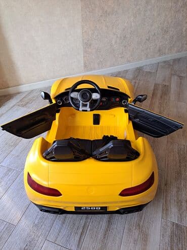 детский мотоцикл каталка: Uşaq üçün elektrikli ride-on avtomobil – sarı rəngdə sport kabriolet — 5