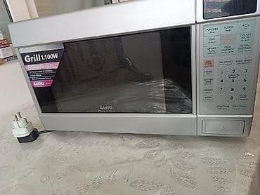 par utuleri: SANYO Cook ‘n’ Grill mikrodalğalı soba Xüsusiyyətlər: - 1 100 W güc — 7
