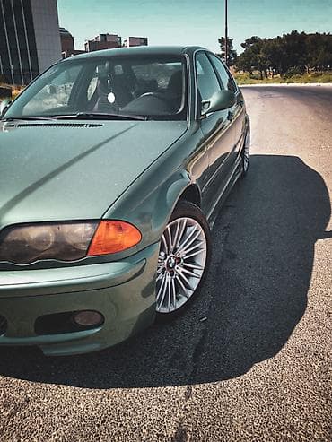 mazda 2: BMW 3 series: 2.5 l | 2000 il Sedan — 6