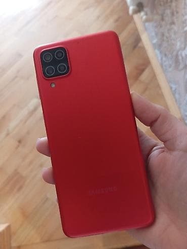 azercell modem internet paketleri: Qırmızı korpuslu smartfon - Ön hissədə damla tipli kamera çıxıntısı — 6