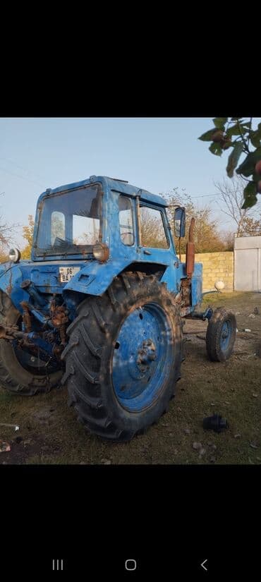 rengli işıq: Mavi rəngdə MTZ tipli təkərli traktor. Texniki xüsusiyyətlər və — 3