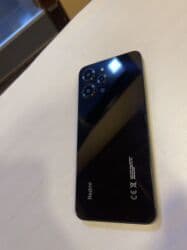 xiaomimi 10256 gb: Xiaomi 12, 128 GB, rəng - Qara, 
 Düyməli, Barmaq izi, İki sim kartlı — 1