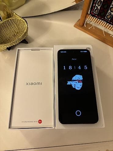 redmi pad 2 kabro: Xiaomi 13, 256 GB, rəng - Qara, 
 Barmaq izi, Simsiz şarj, İki sim kartlı — 4