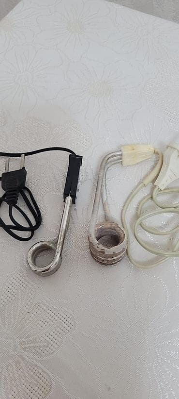 Mini su qizdirici cay qaynatmaq ucun caskayada yerlesir — 2