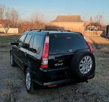 ucuz maşin: Honda CR‑V (II nəsil) – qara rəngli, 5 qapılı krossover/SUV — 2