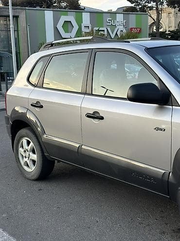 Hyundai Tucson: 2 л | 2005 г. Кроссовер — 8