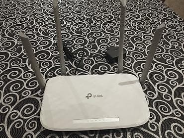 hp netbook mini: Router TP-Link Archer C50 — 1