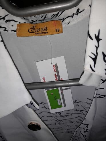 ağ koftalar: Kofta xanımlar üçün olan bu gözəl qısaqol kofta satılır. 38 razmerdir — 5