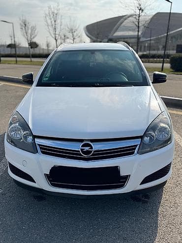 afdomobil: Opel Astra Caravan (Universal) - Kuzzov: universal (Caravan), ağ rəng — 10