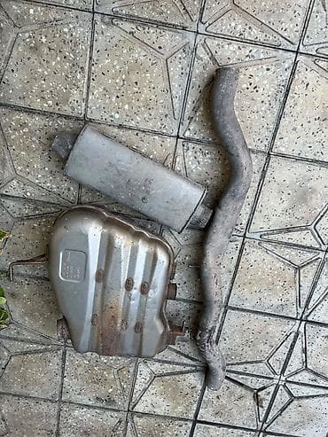 Avtomobil üçün egzoz sistemi hissələri Tərkib: - Səsboğucu (silindrik