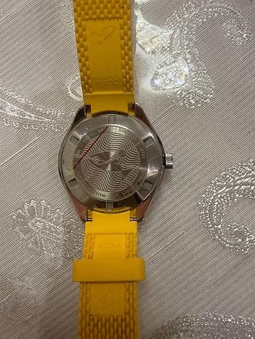işlənmiş saat: Doxa saat. Dubaydan alınıb. 5500aed. Pasportu ve qutusu yoxdur. Unisex — 3