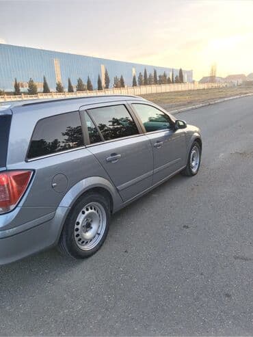 ucuz tofaş: Opel Astra H Caravan (universal), boz rəng. - Kuzov: 5 qapılı — 3