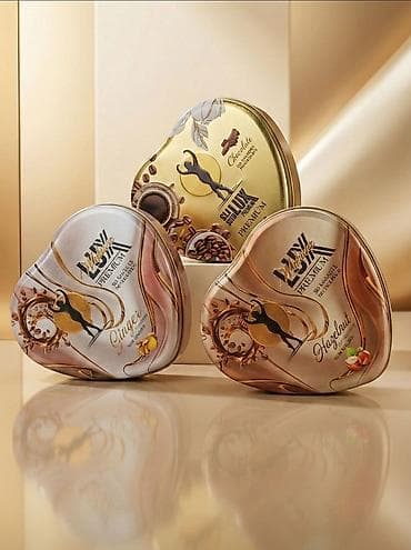 toxuma ipler: SƏL LUX PREMIUM drajelər – zərif ürək formalı metal qutuda premium dad — 1