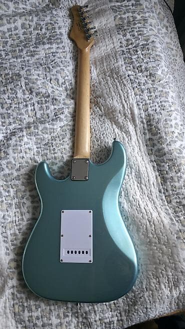 gitara temiri: Smiger L-G2. renfi çox gozeldir, göy rengdir, parıltılıdır — 3
