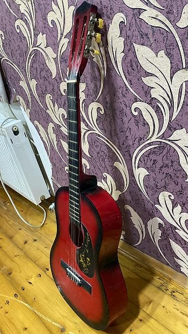Velosipedlər: Salam gitara satılır ideal vəziyətdədir sadəcə siminin 1 i qırılıb — 5
