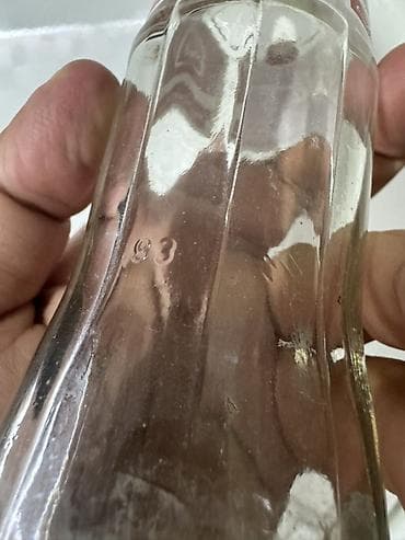 Məhsul: Şüşə Coca‑Cola butulkası Təsvir: - Həcm: 0.25 L (etiketdə — 7