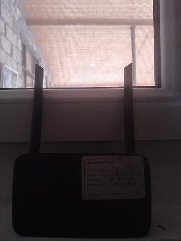 İki antenli Wi‑Fi router - Ev və ofis üçün stabil simsiz internet