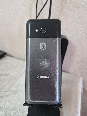 philips xenium x703: Philips Xenium düyməli mobil telefon Xüsusiyyətlər: - İki SIM dəstəyi — 2