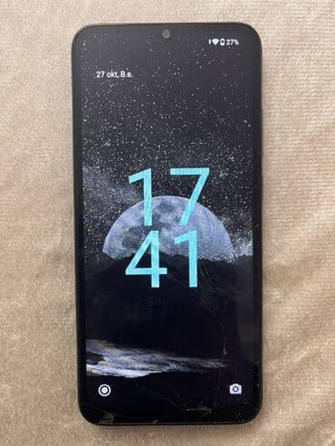 yarı tikli: Xiaomi Redmi A2+ smartfon Şəkildə göründüyü kimi ekranda çat var belə — 1