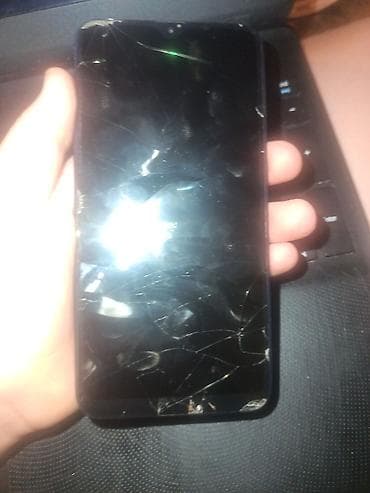 samsung es: Samsung A10e, 32 GB, rəng - Göy, Qırıq — 1